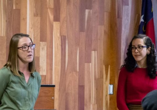 Image of Growing Minds team pitching idea.